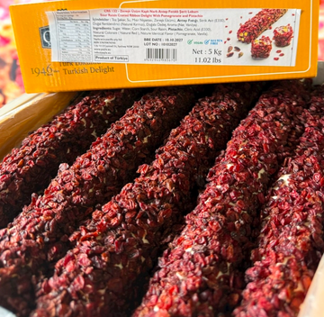 Sour Raisin Coated Ribbon Delight with Pomegrante
