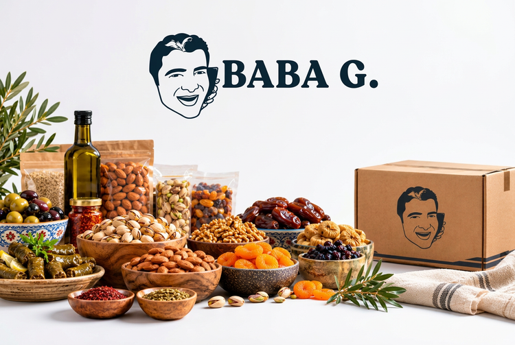 Baba G pantry spread of nuts, dried fruit, olives, dates and spices beside a Baba G delivery box